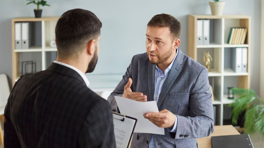two businessmen arguing