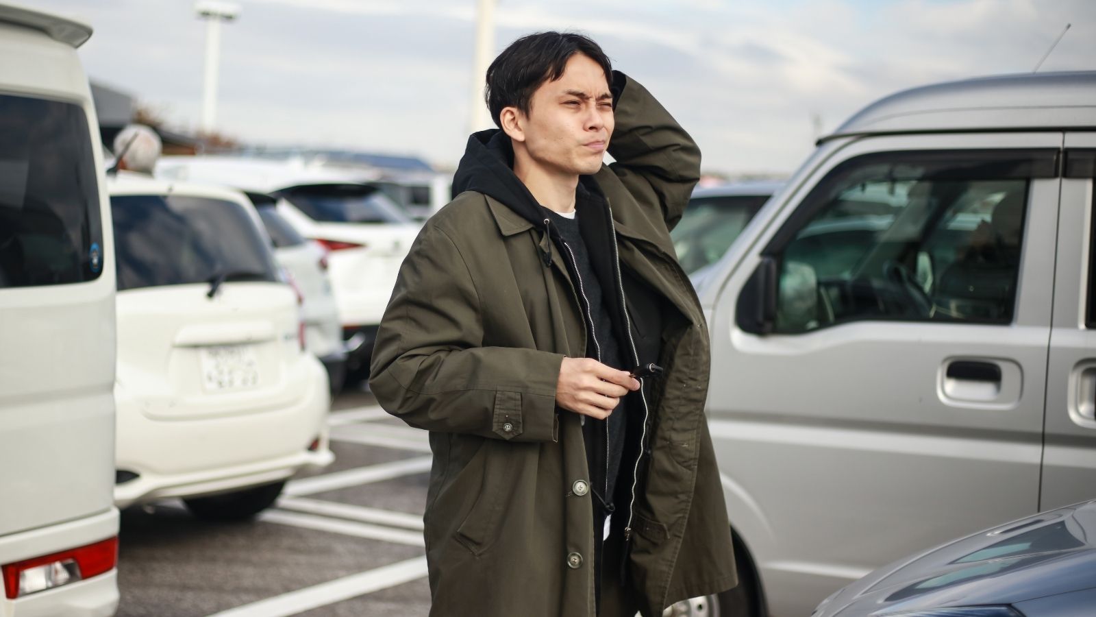Man Waits for Parking Spot at Restaurant, Then Confronts Driver Trying to Take It man standing in parking lot looking confused