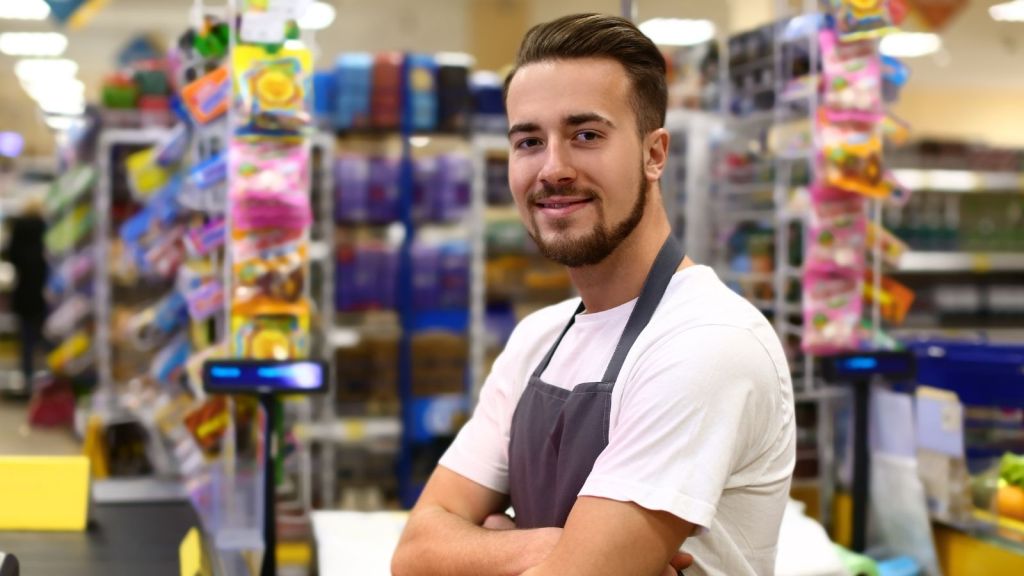 male cashier at a grocery store