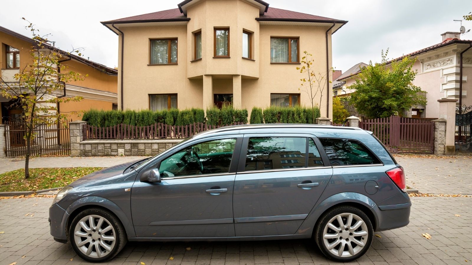 car parked in front of house