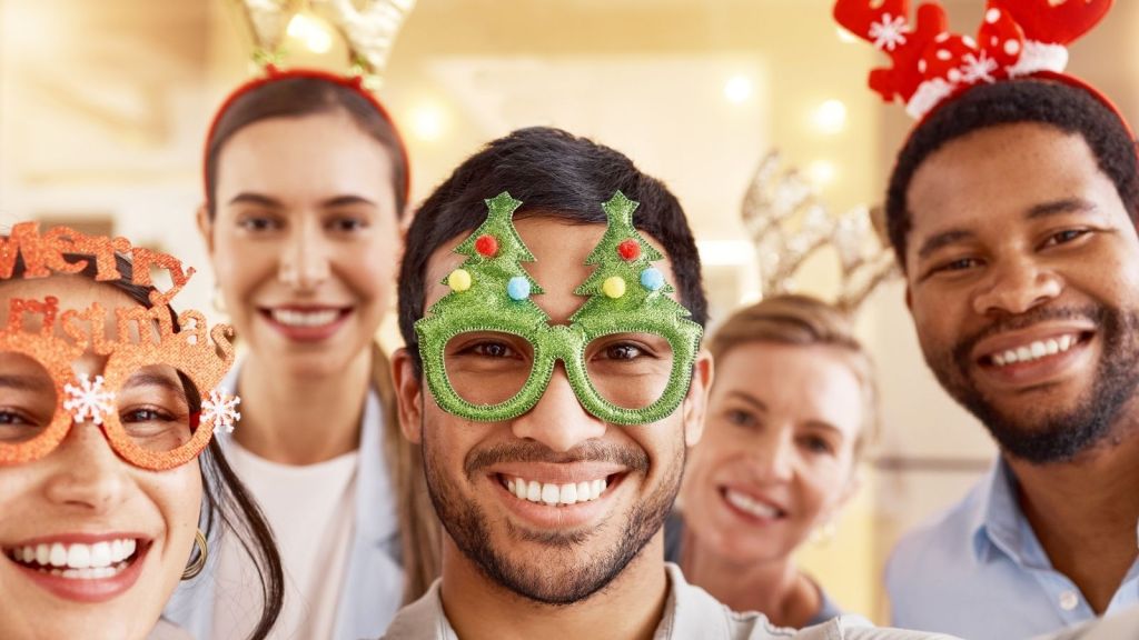 employees taking a selfie at a Christmas party