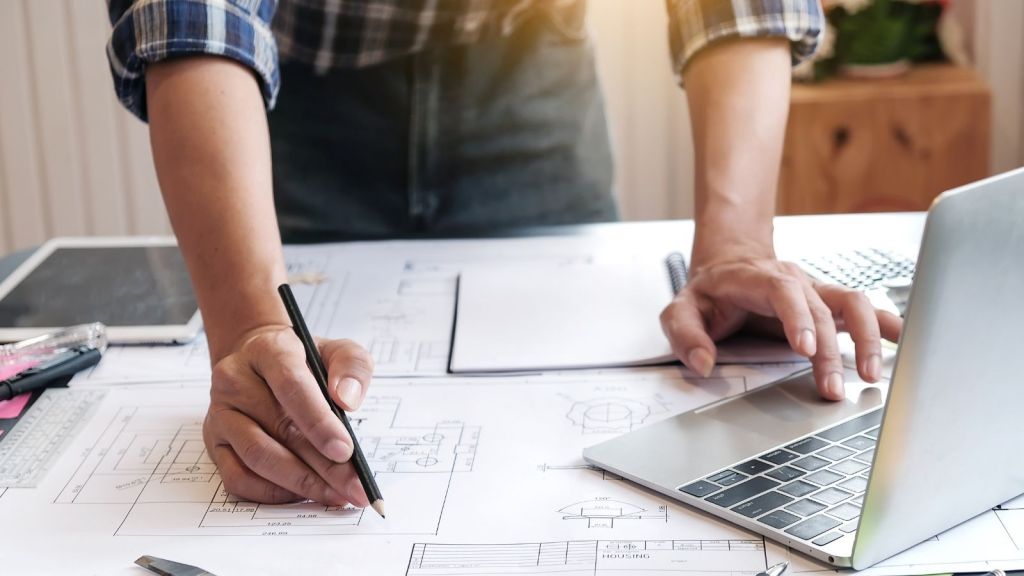 architect working on a drawing