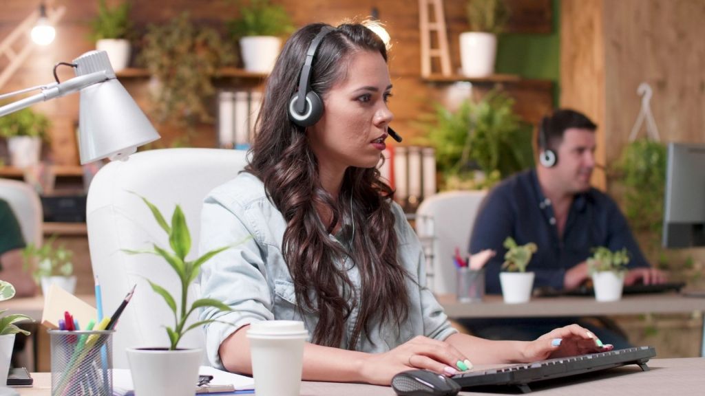 customer support employee wearing a headset