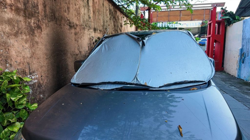 car parked in narrow alley