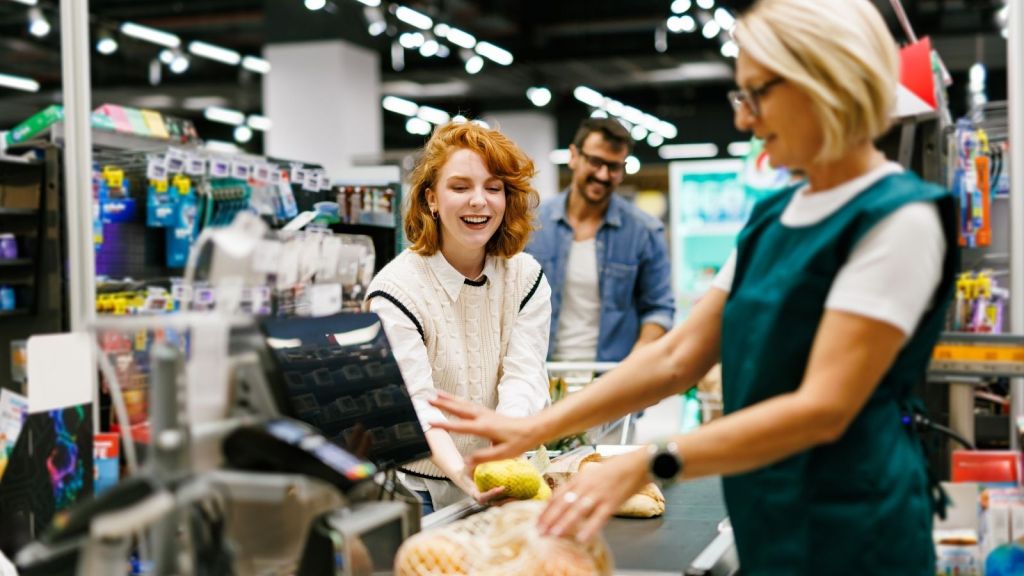 cashier scanning groceries