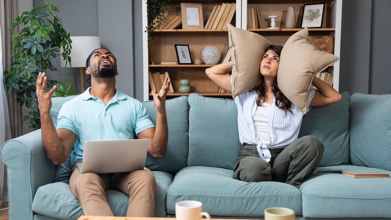 couple annoying by noisy upstairs neighbor