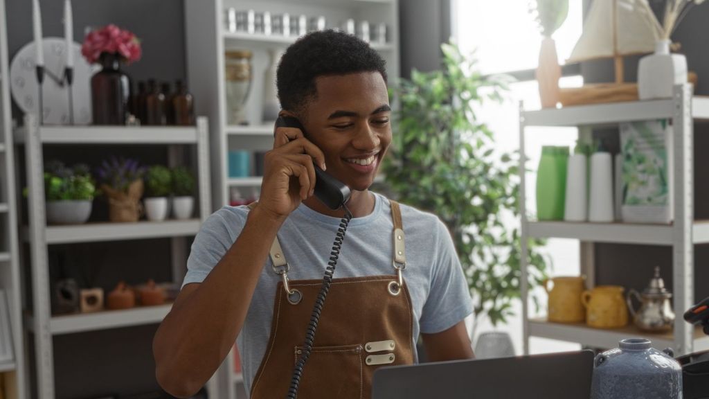 retail worker talking on the phone