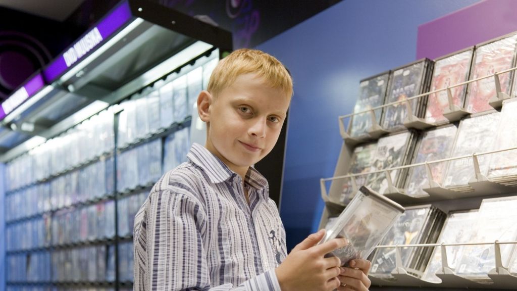 boy looking at video games