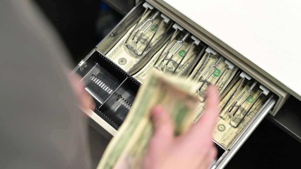 cashier opening cash drawer
