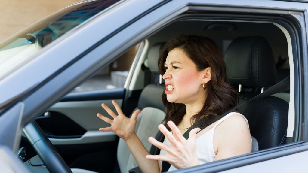 angry woman driving a car