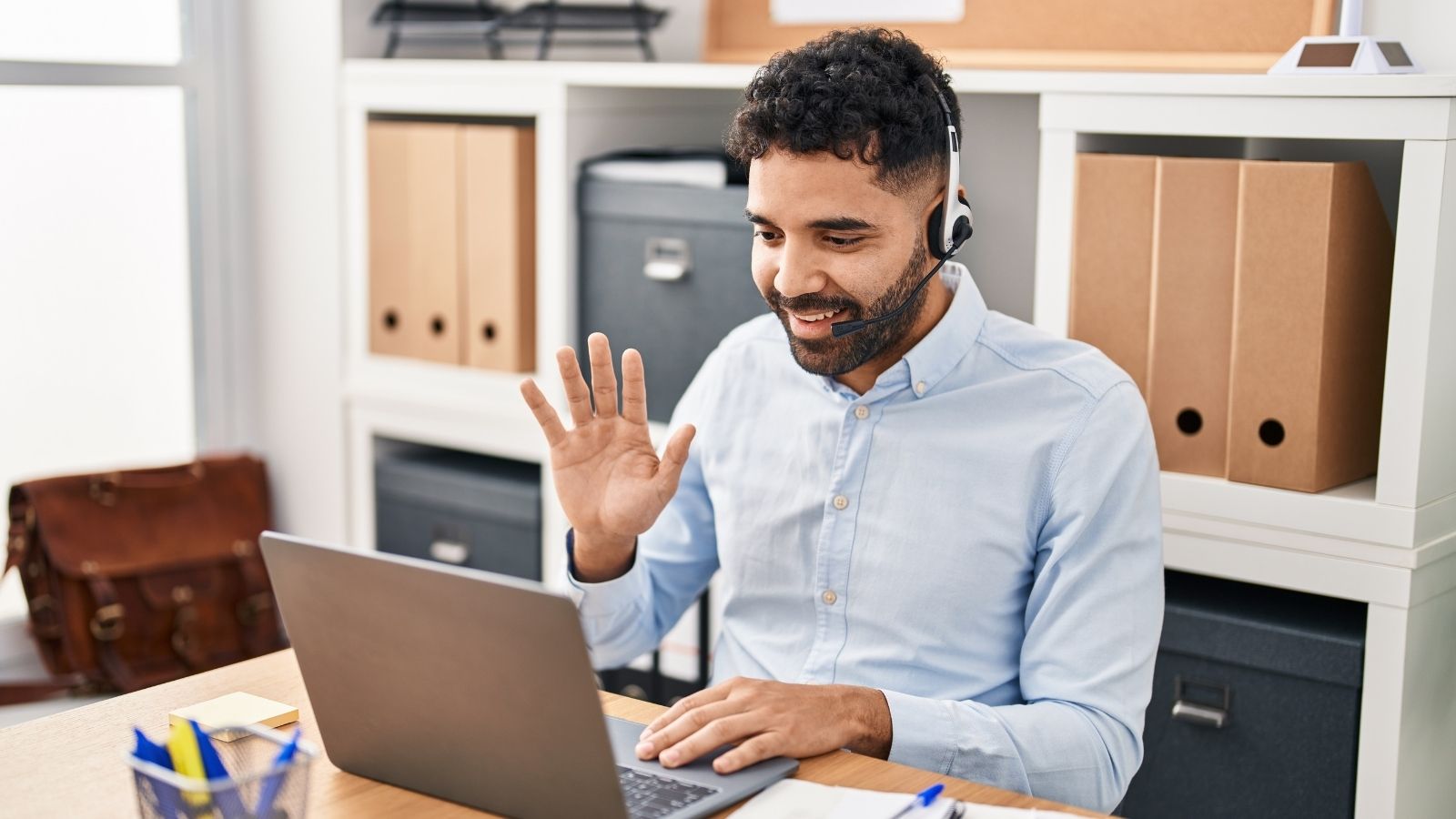 man in a video call at work