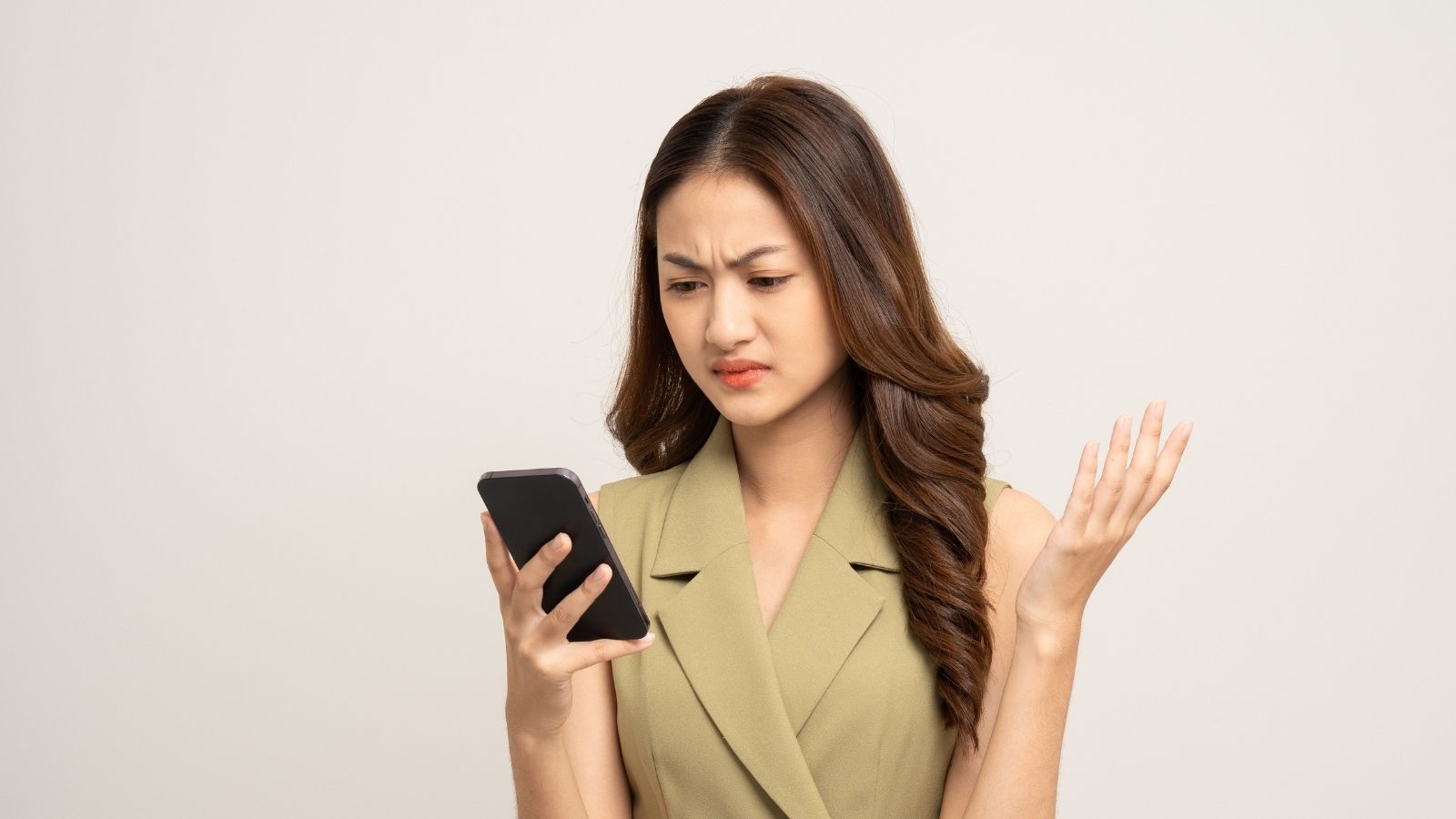 She Has a Shot at a United Nations Internship — All She Needs Is One Response From Her Supervisor and He Wont Reply stressed out young woman looking at her phone