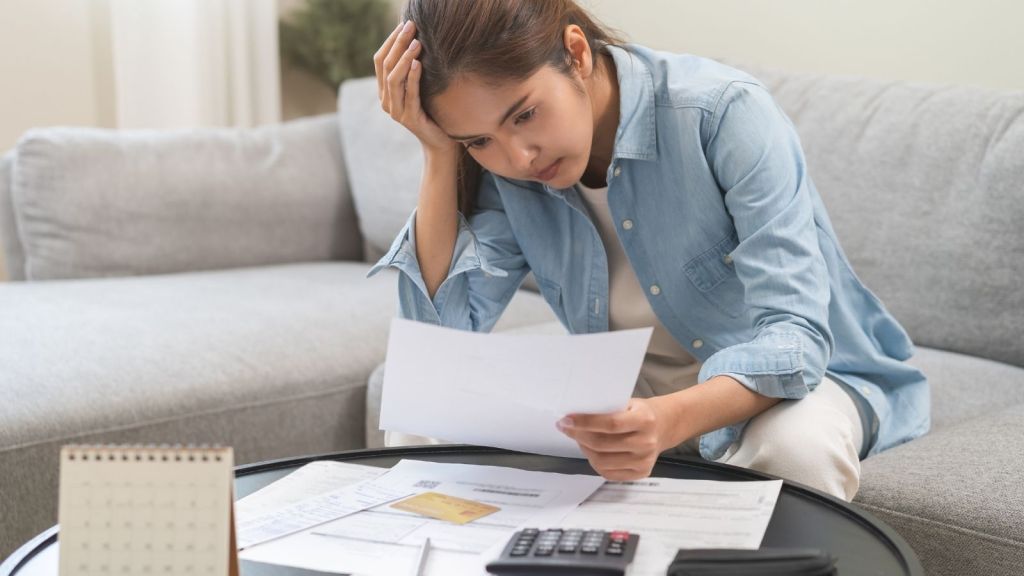 woman stressed out about bills