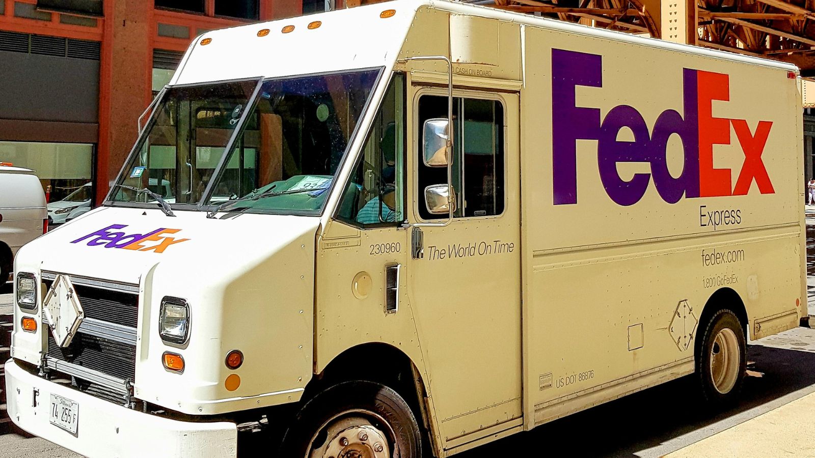 A FedEx truck parked on the side of the road