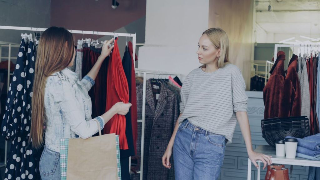 Two women shopping for dresses