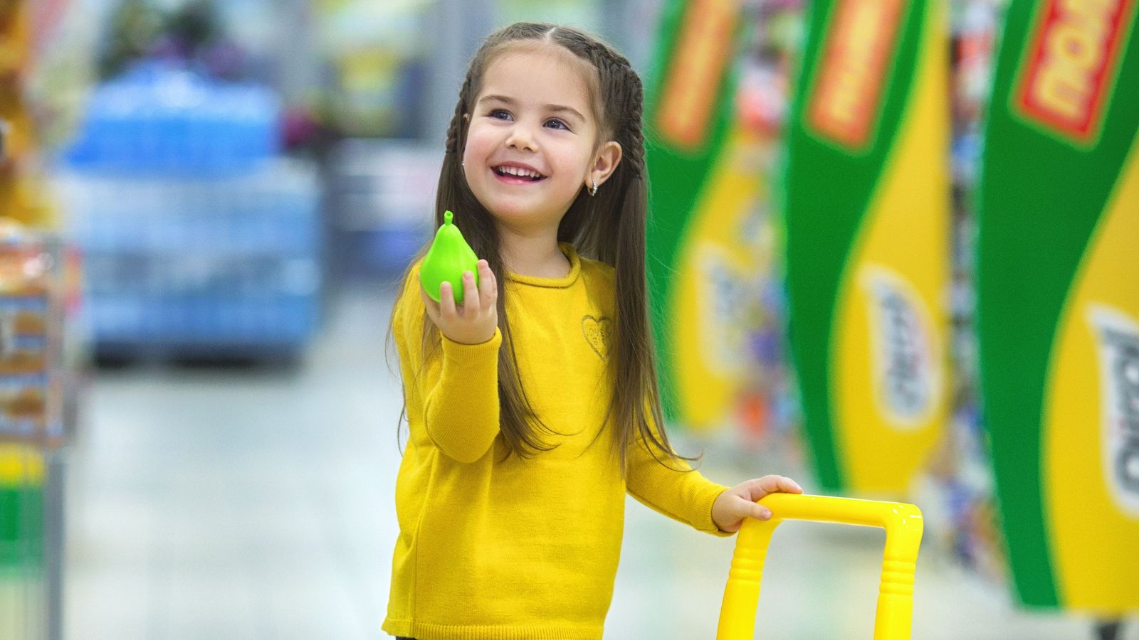 Target Shopper Mistaken for Employee Gets Surprised by Little Girl’s Sweet Request Cute little girl wearing yellow shirt in a store