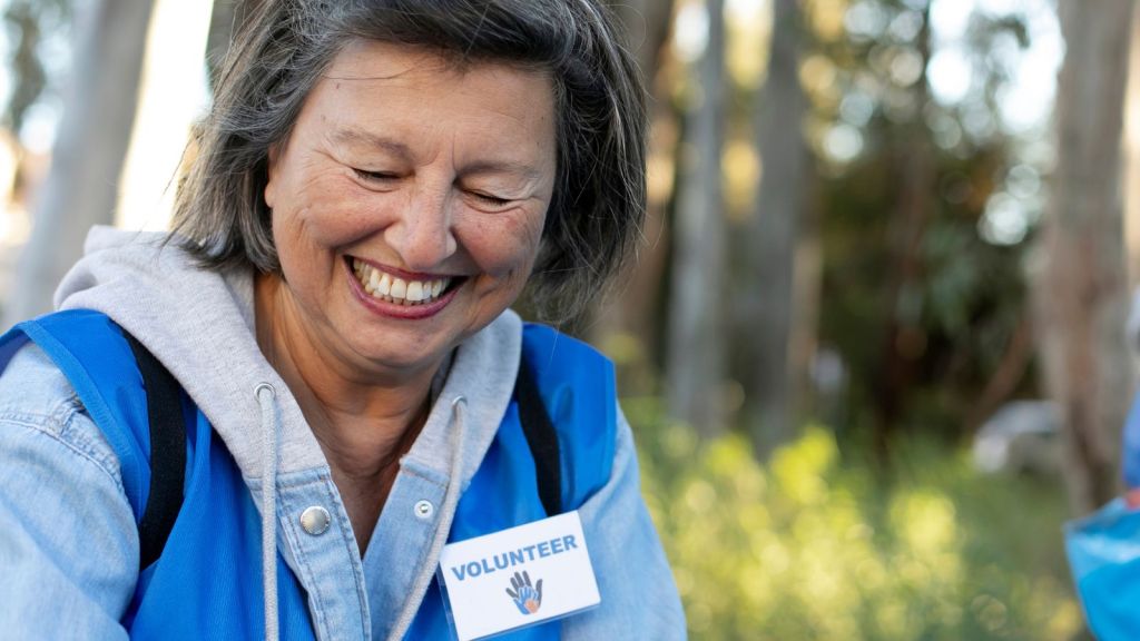 Woman enjoying being a volunteer outdoors