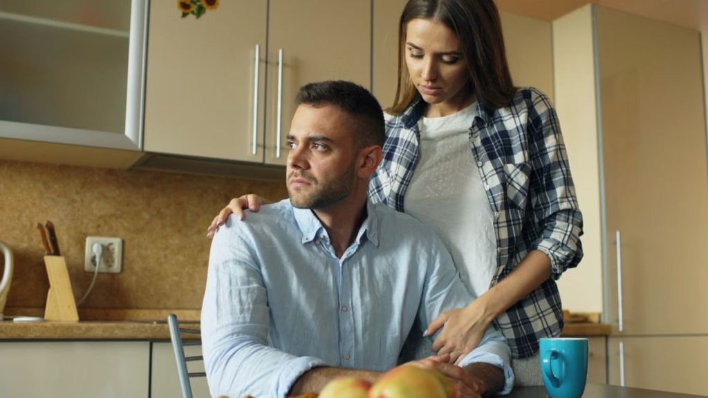 Woman caring and comforting her partner