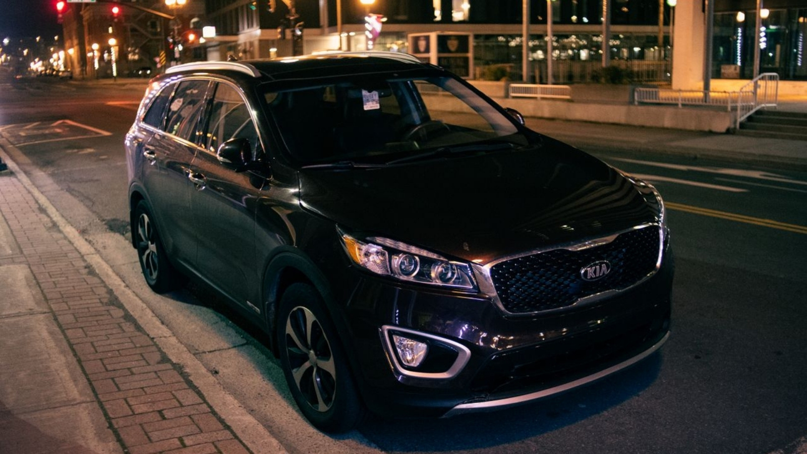 His Girlfriends Friend Is Staying With Them, and Has Been Borrowing His SUV Without Permission Elegant black SUV parked at night