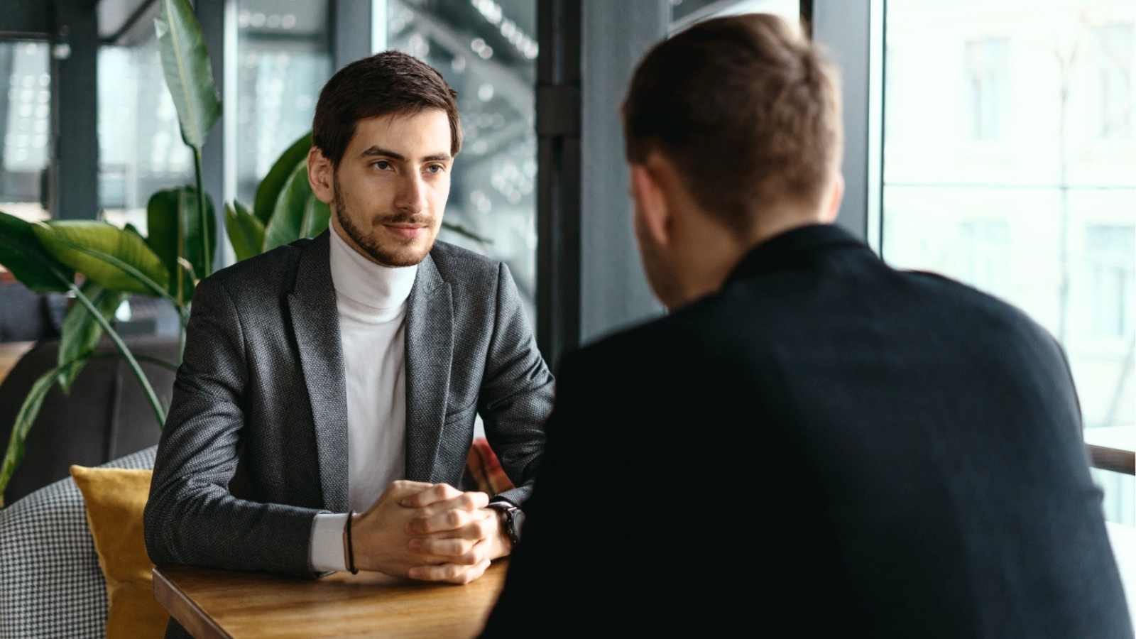 He Invited His Friends to Join His Startup, but Cut Ties When They Demanded More Equity Than Their Original Deal Two young businessmen discussing something