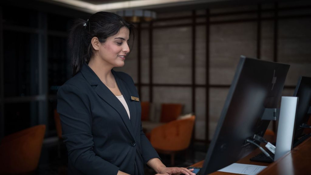 Woman working at front desk