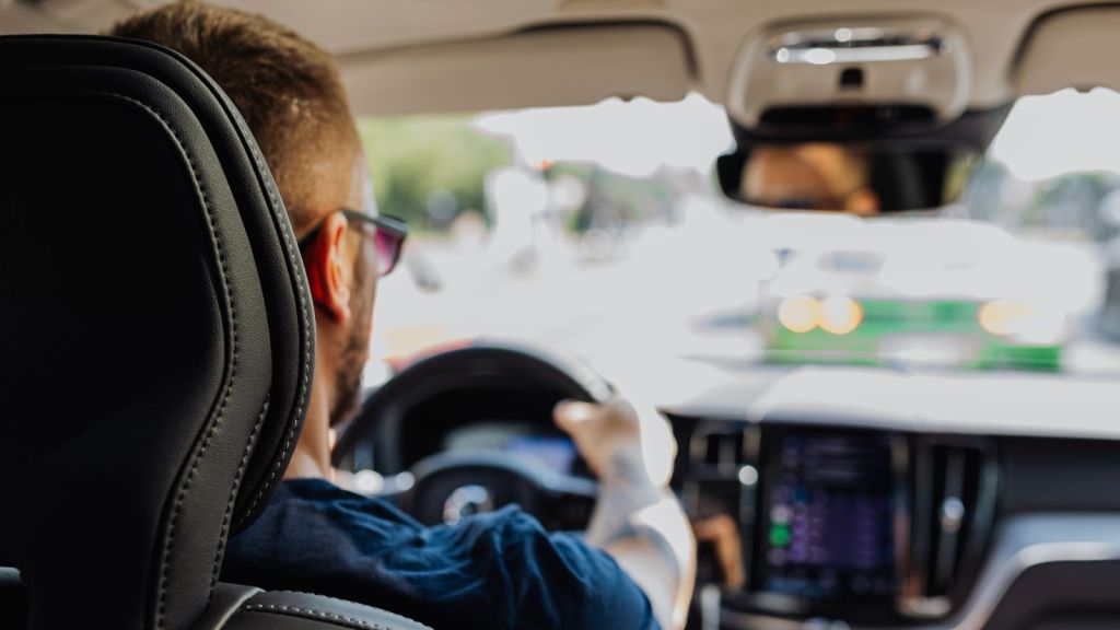 Man driving a car