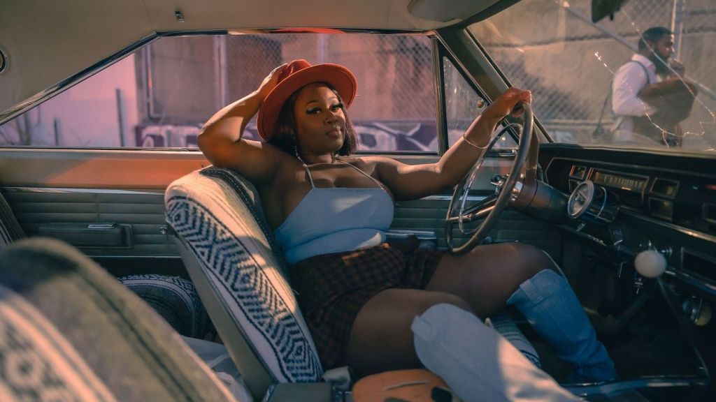 Driver sitting in her car, waiting
