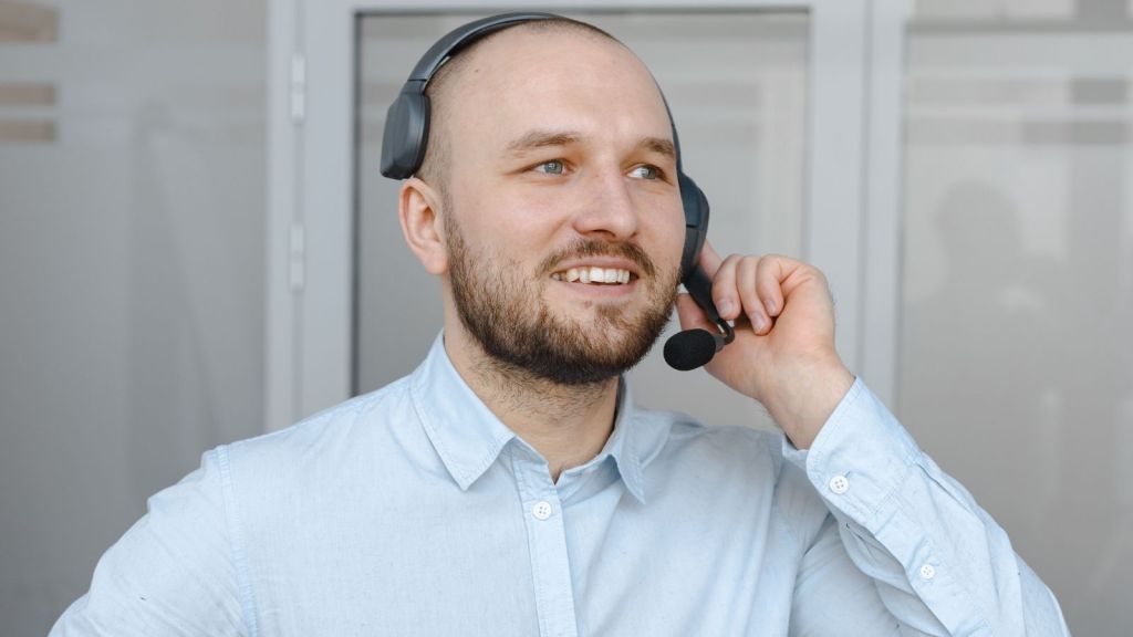 Man in blue shirt at work