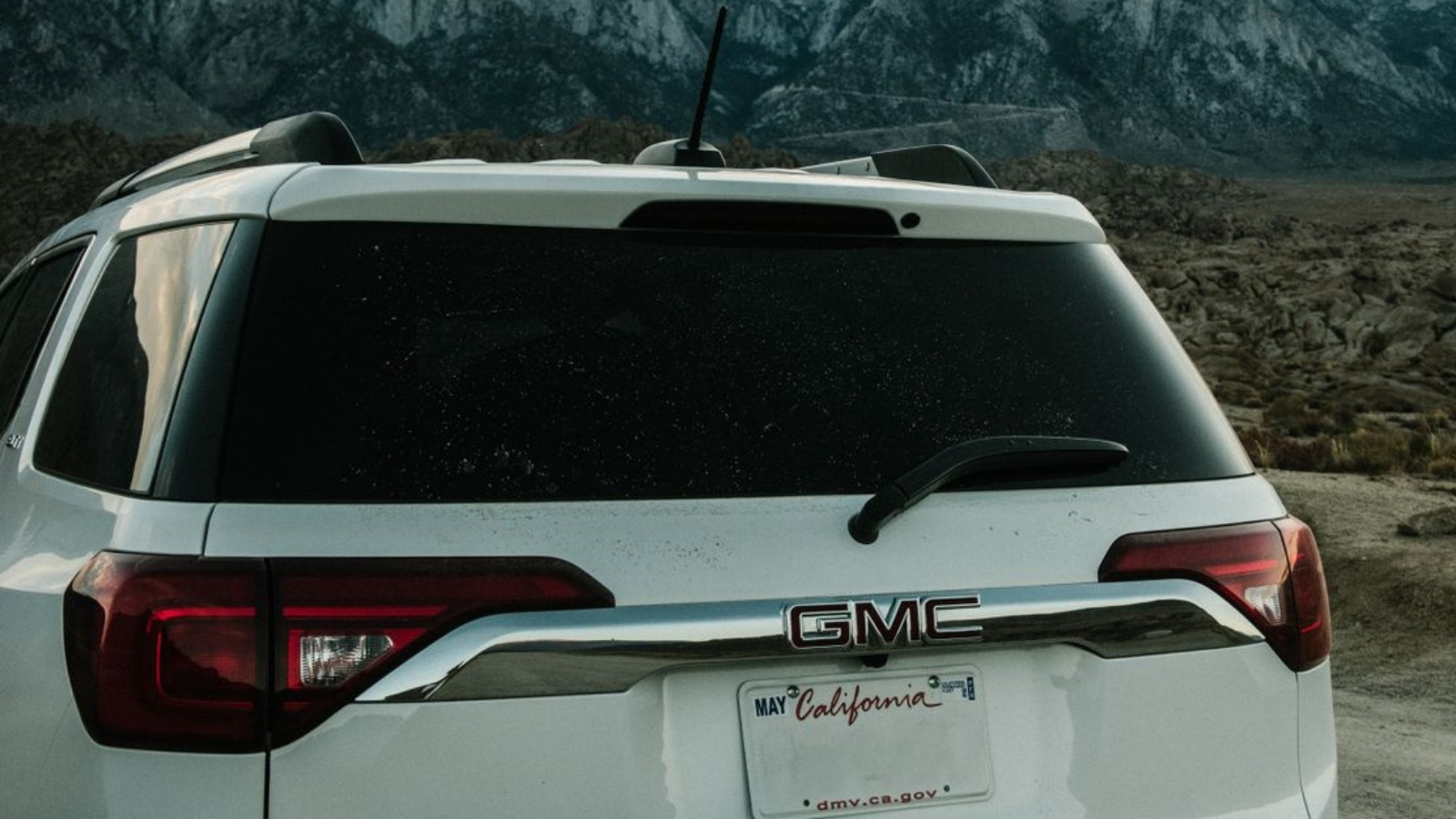 White Yukon Denali outside
