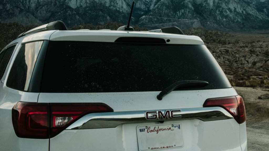 White Yukon Denali outside