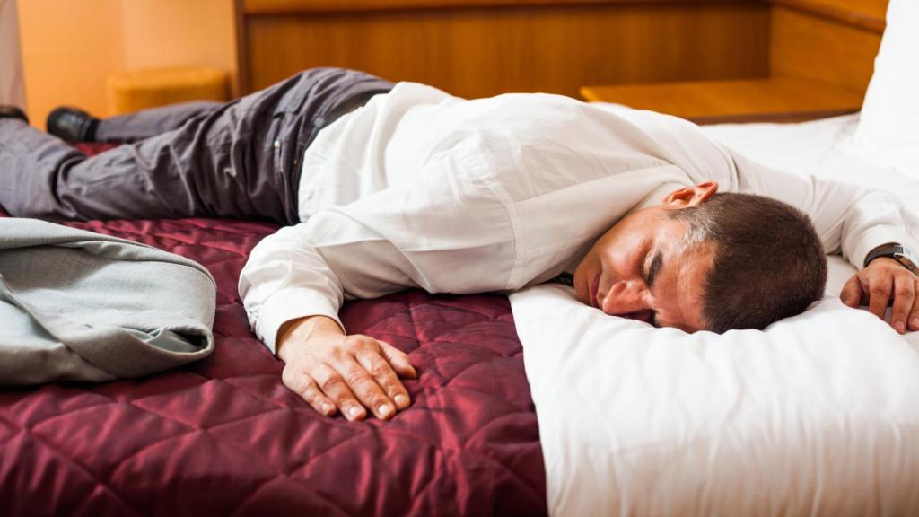 man laying on a bed