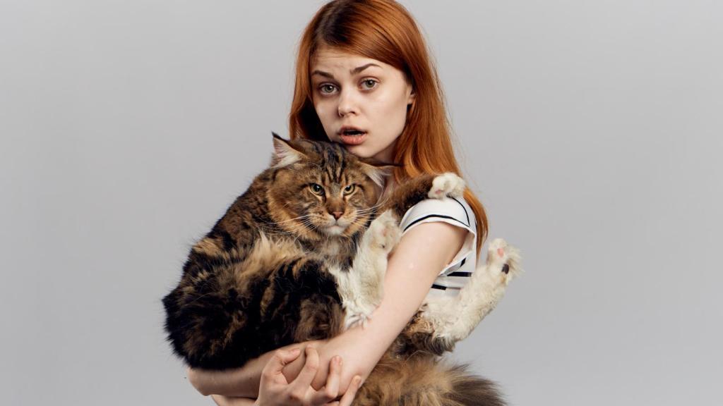 woman holding a cat
