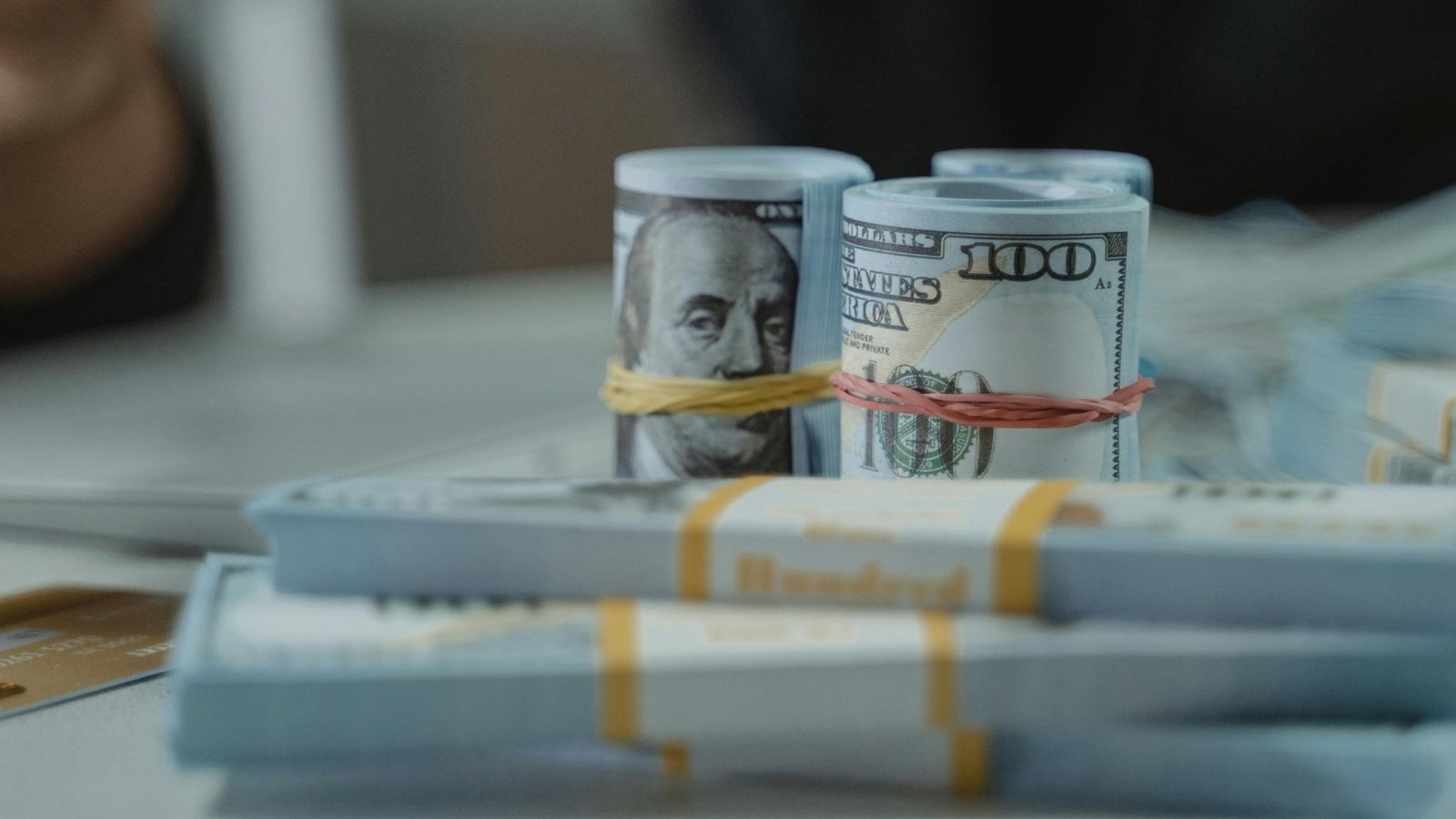 bundles of cash on the table
