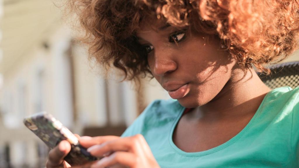 closeup of woman holding a cellphone