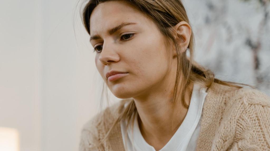 closeup of woman looking upset