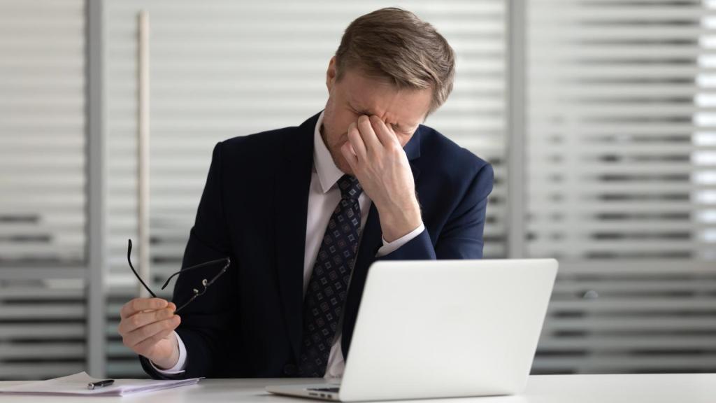 man at his desk