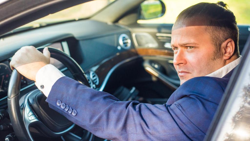 man in a car