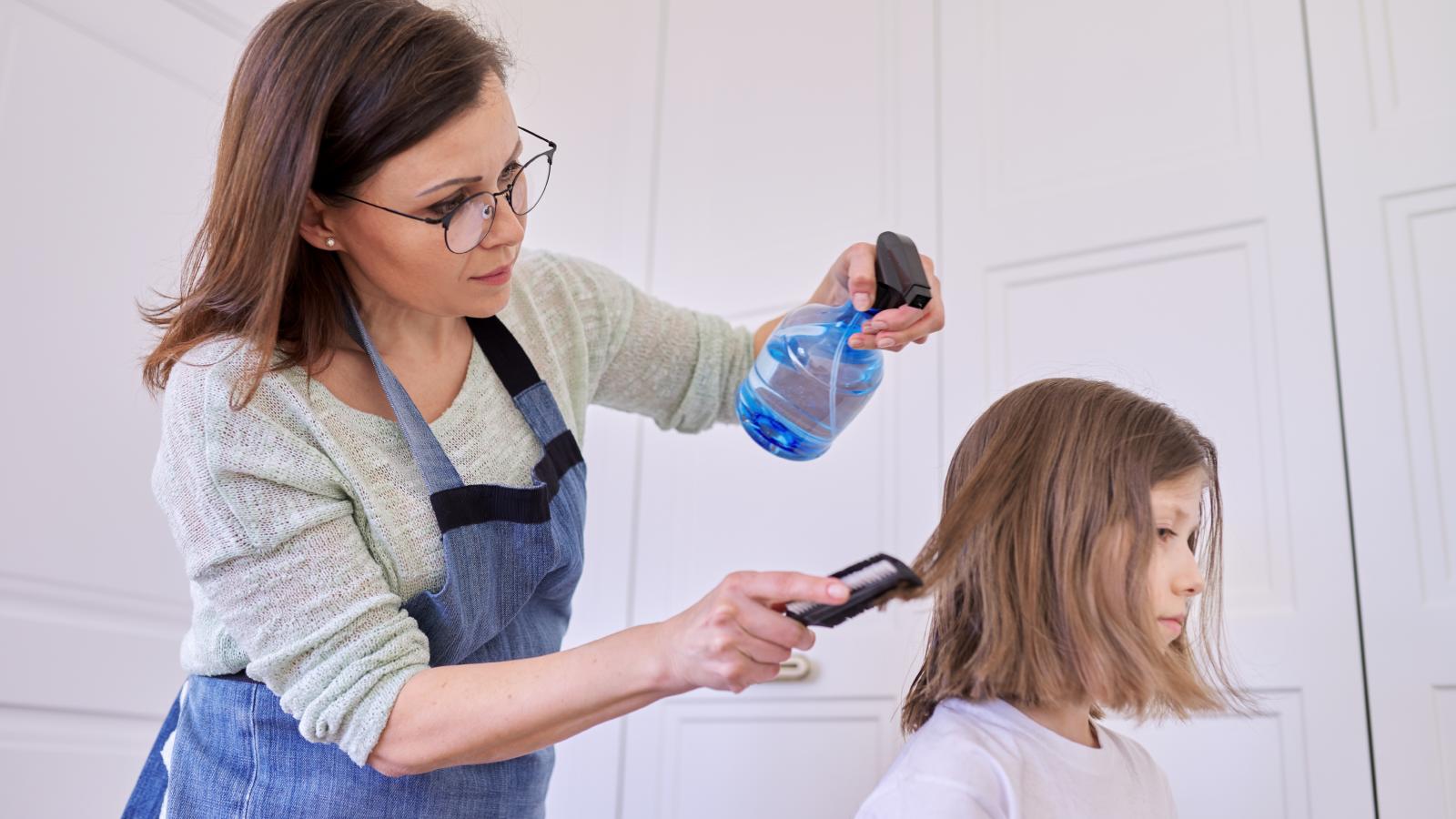 Without My Permission: A Father Blew His Top After His Ex Wife Secretly Changed Their Daughters Hair woman cutting girl's hair