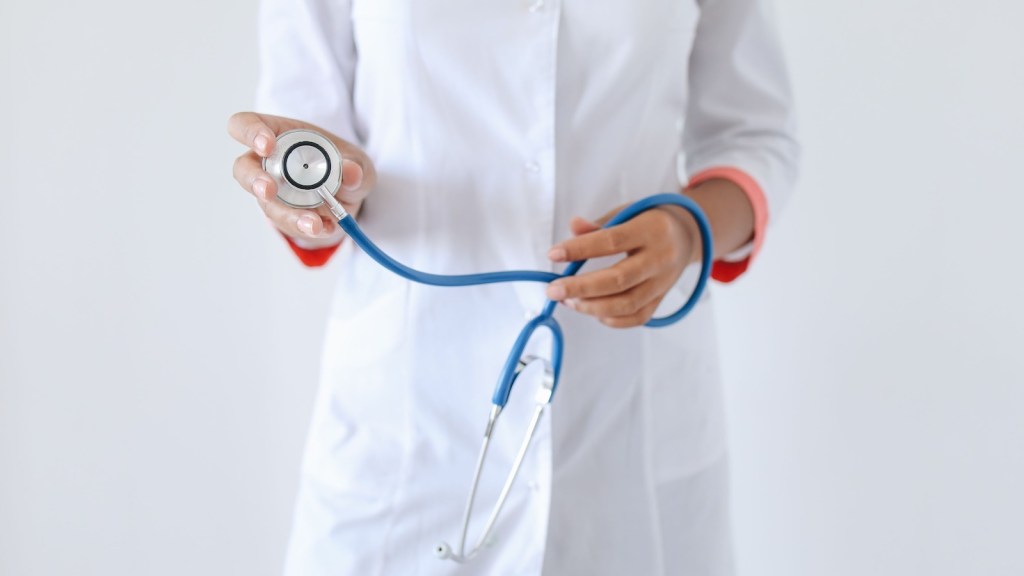 doctor holding a stethoscope