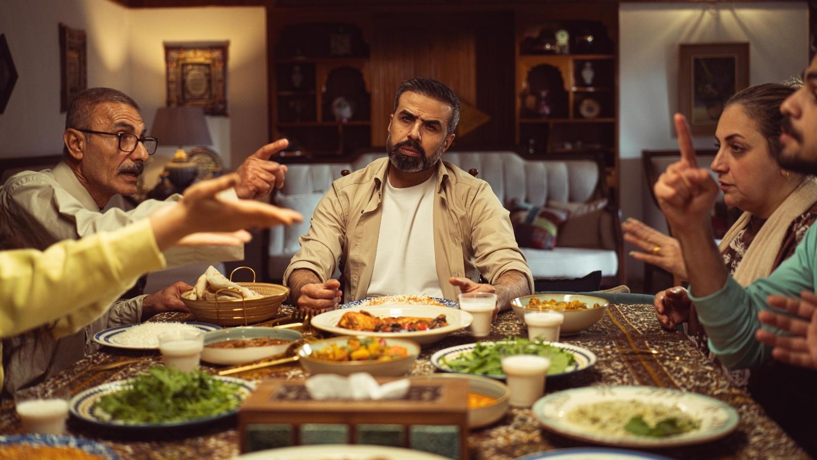 family arguing at the dinner table