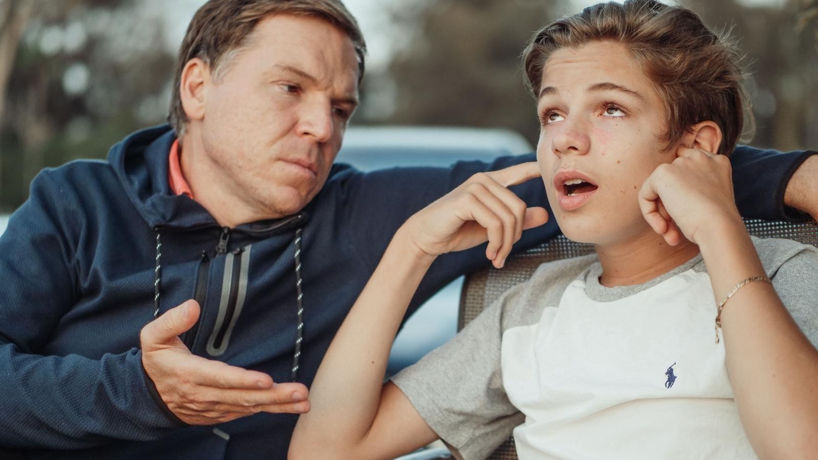 father and teenage son arguing