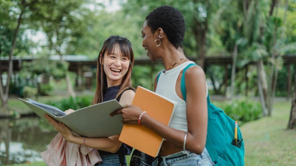 female college students walking around on campus