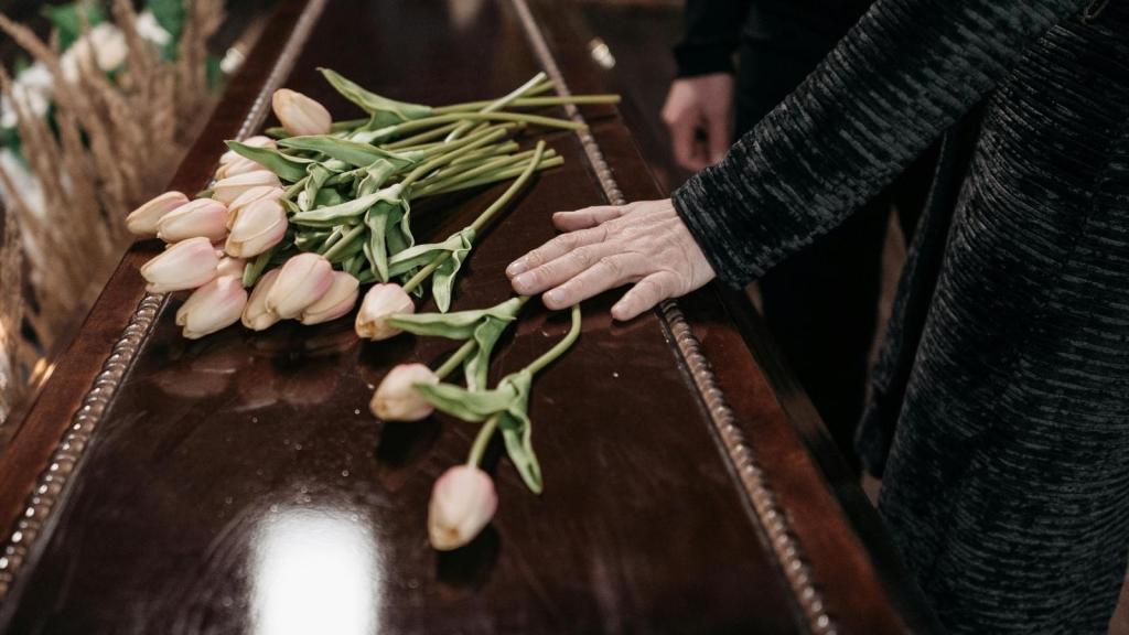 flowers sitting on a casket