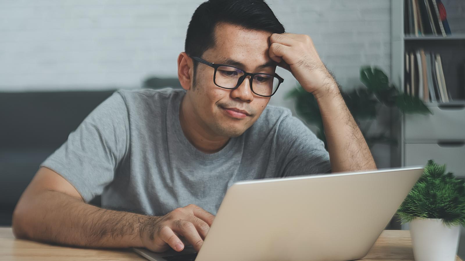 man on a computer