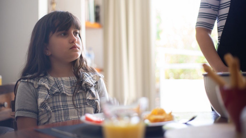 girl eating breakfast