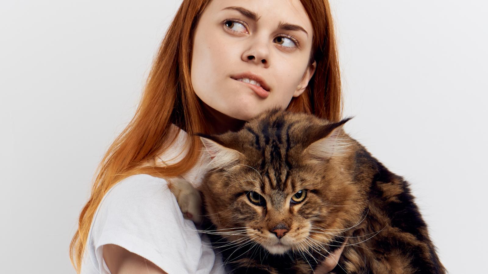 woman holding a cat