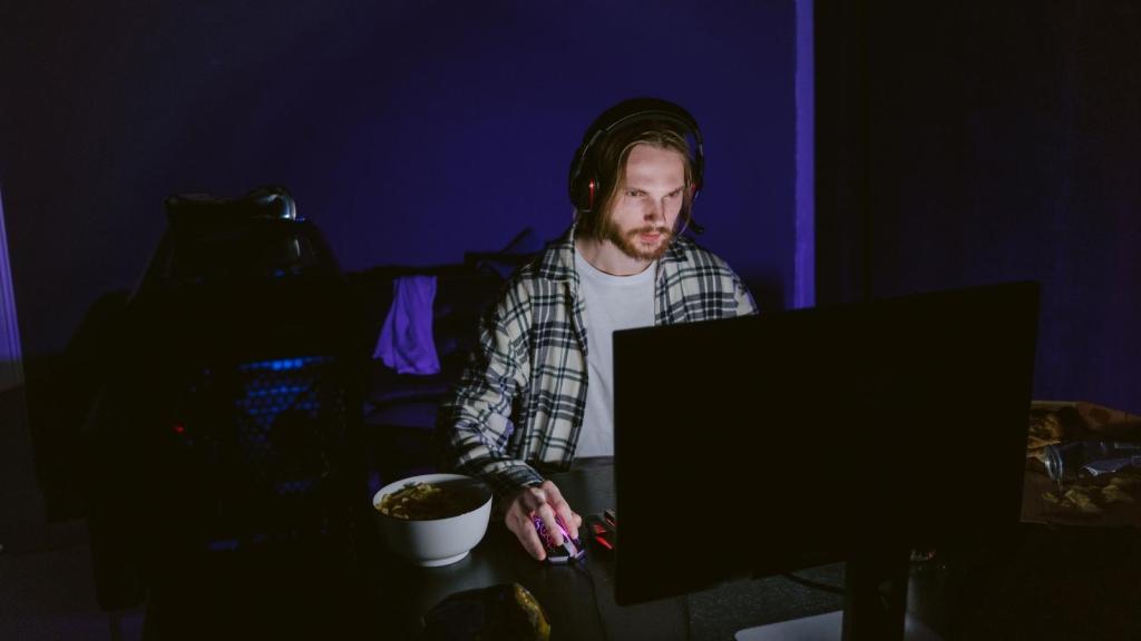 man staying up late in front of computer