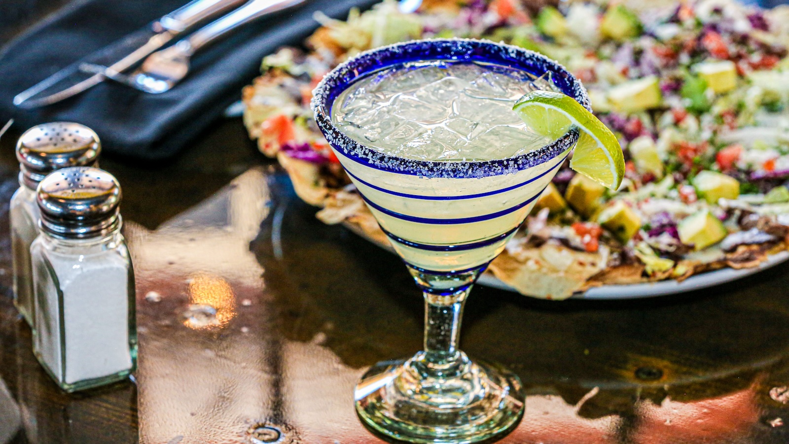 close up of margarita and mexican food at a restaurant