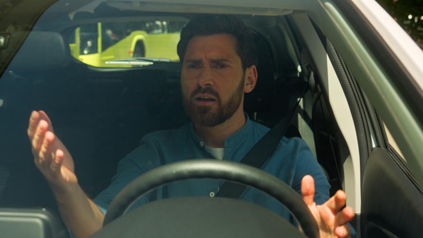 man in a car
