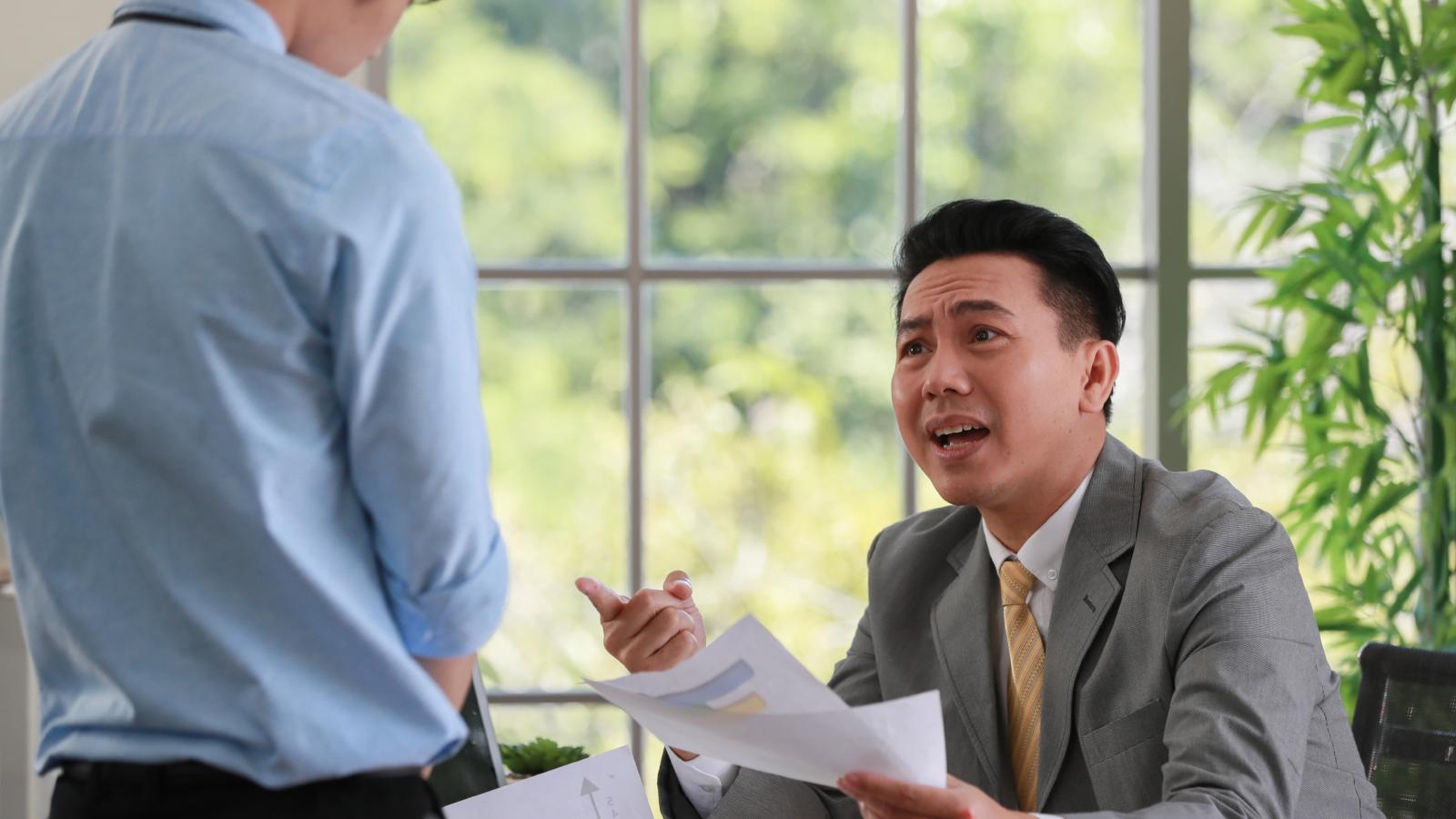 man talking to his boss